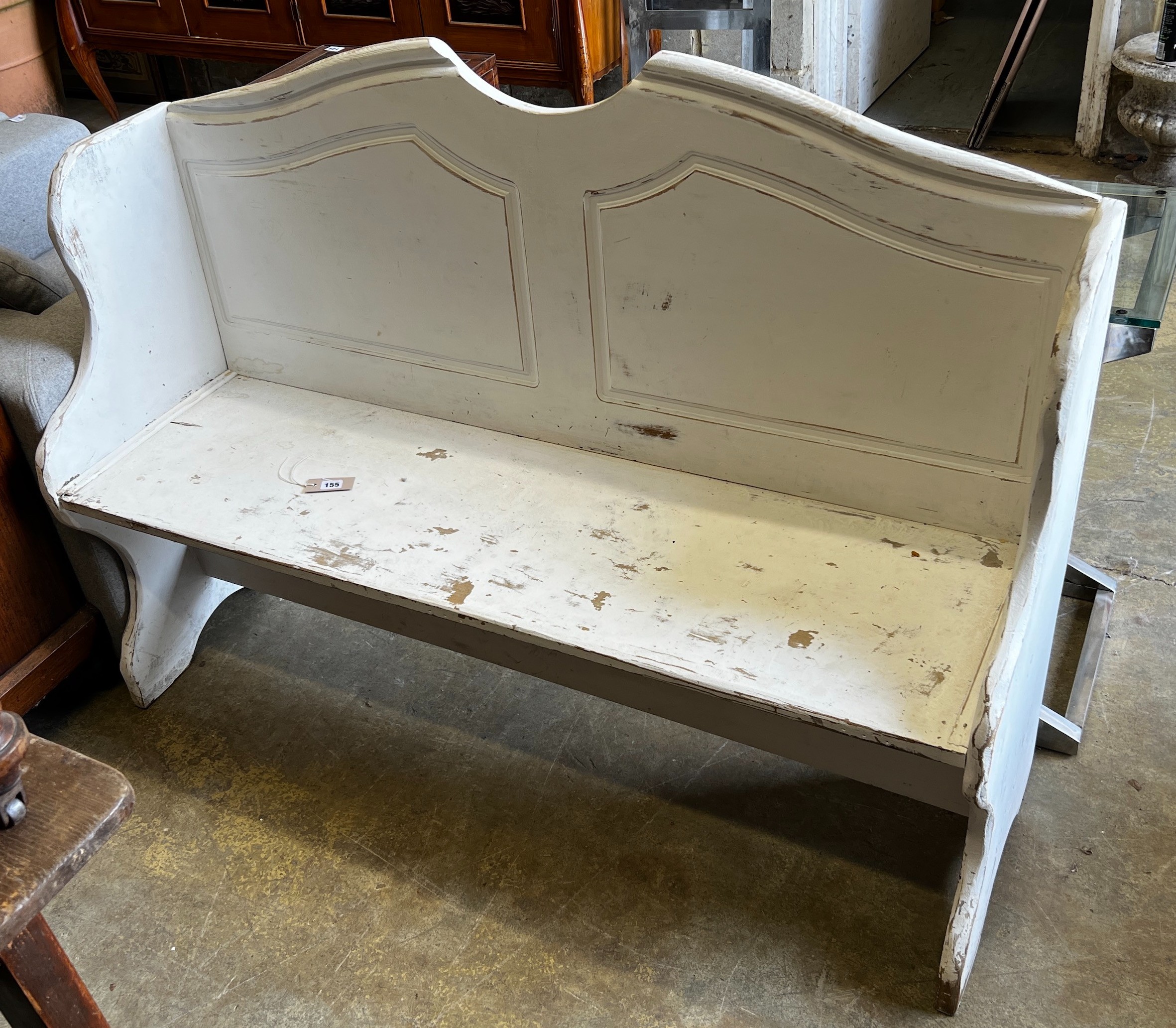 A 19th century style continental painted oak settle, width 143cm, depth 44cm, height 100cm